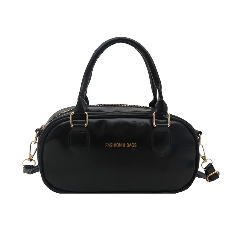 Hand carry fashion tote bag 2025 spring and summer new simple casual shoulder bag high-end trend oblique span bag