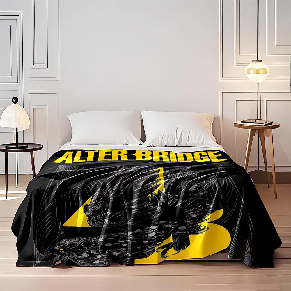 A stylized black bird entwined with yellow text and abstract line art. for all seasons blanket lunch break throw gift