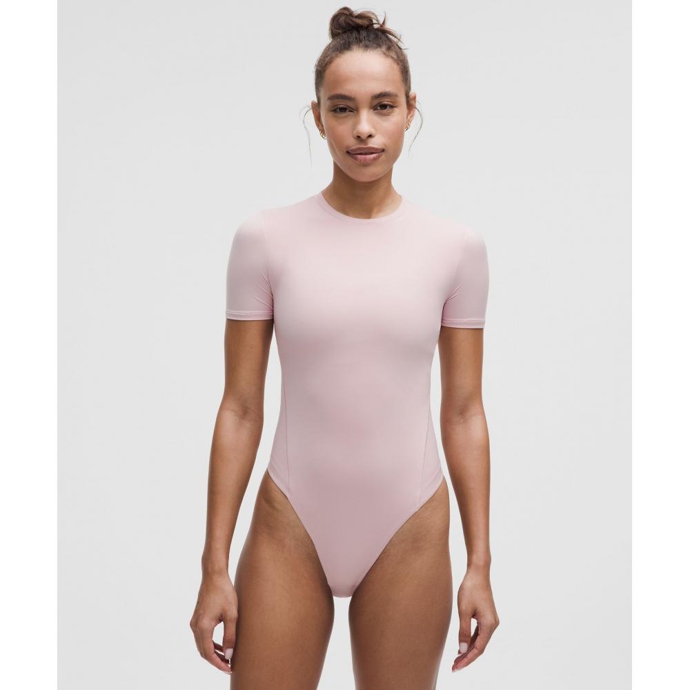 

Lululemon Wundermost Ультрамягкий боди Nulu с короткими рукавами и стрингами Pink Haze XS