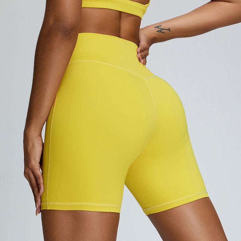 

Belly Contracting Peach Fitness Women s Elastic Four-Point Yoga Shorts Lemon yellow L