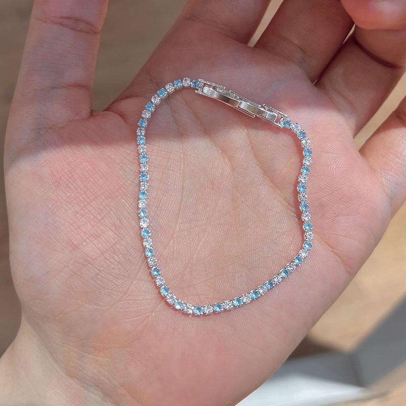 Introducing the "Lake Blue Moonlight" Bracelet: Exquisitely Sparkly Blue and White Zirconia, Perfectly Versatile for Any Occasion.