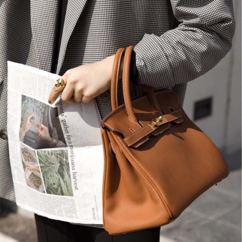 

2024 Platinum bag togo leather first layer lychee pattern cowhide fashion leisure commuting large capacity leather women s bag portable small 25cm birkin bag коричневий
