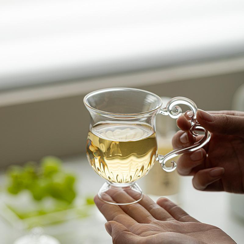Vintage handgjord tekanna i glas, tekopp i högt borosilikatglas, rättvis kopp, redskap för eftermiddagste