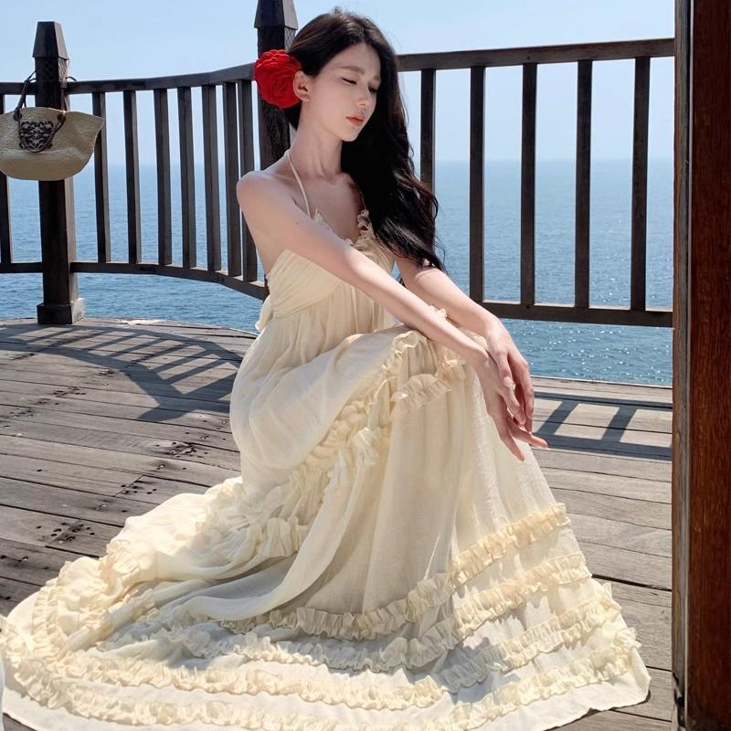 Seaside beach temperament dress suspender vacation dress beige sexy halter fairy summer mopping atmosphere