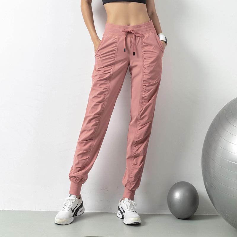 2021 Spring Women's Breathable Loose Fit Nine-Point Running Pants with Pockets