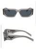 Prada PR09ZS Transparent Grey Sunglasses, Modern UV400 Shades with Triangle Logo