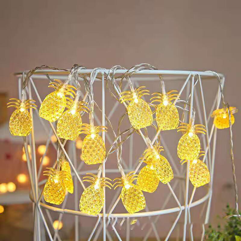 Różowo-złote LEDowe girlandy dekoracyjne z ananasami