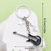 Antique Silver Music Cassette & Saxophone Keychain with Creative Design
