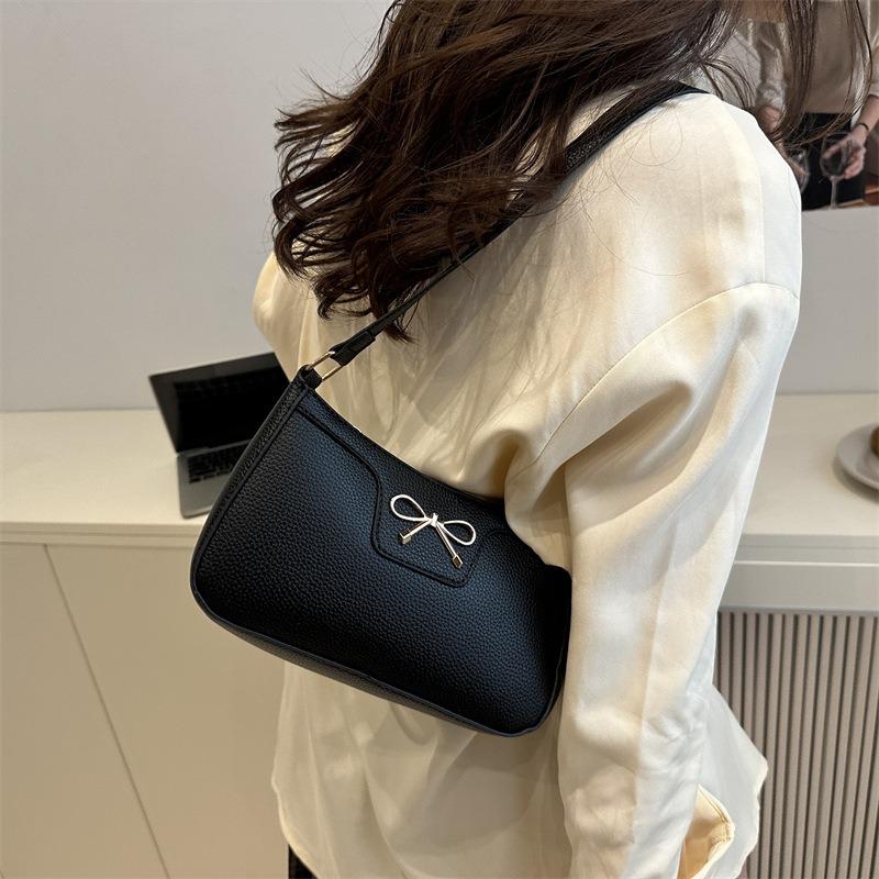 Solid color fashion bow new trendy texture commuting shoulder underarm baguette bag women
