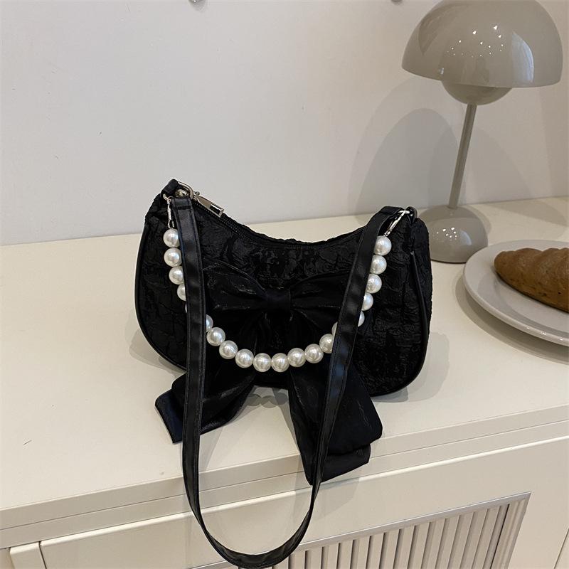 Popular design pearl handbag bag women's summer new messenger bag bow shoulder armpit bag