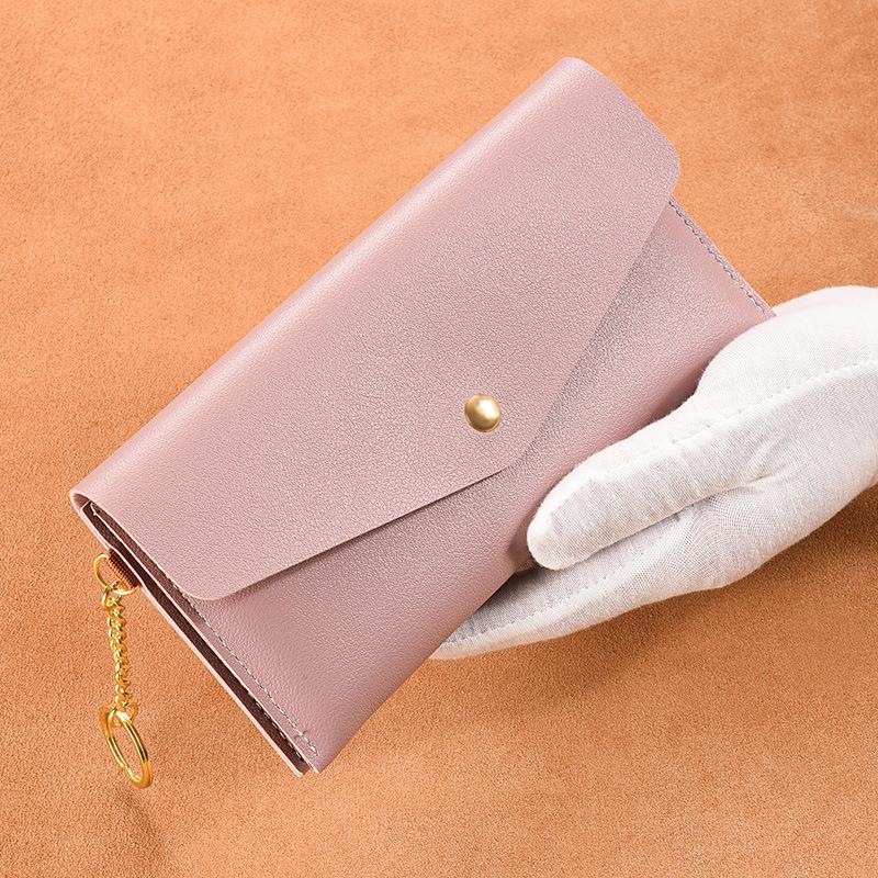 

New women s wallet, long thin clutch bag, simple and fashionable large-capacity soft leather wallet, mobile phone bag. светло-фиолетовый