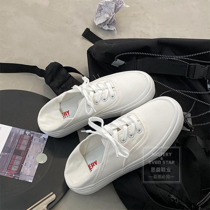 You can step on the heel and half-drag canvas shoes. Women wear white shoes. Women are versatile and pedal lazy shoes 518.