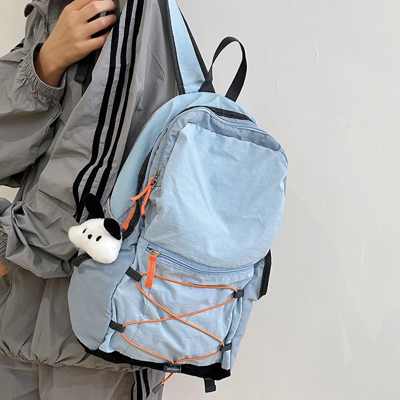 New Style Lightweight Backpack for Junior High Students - Unisex Double Shoulder Bag for Sports, Outdoor, and Mountaineering, Large Capacity.