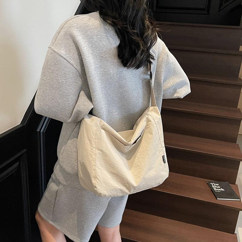 Japanese casual niche design crossbody bag one-shoulder summer cloth bag women's 2025 simple retro commuter tote bag