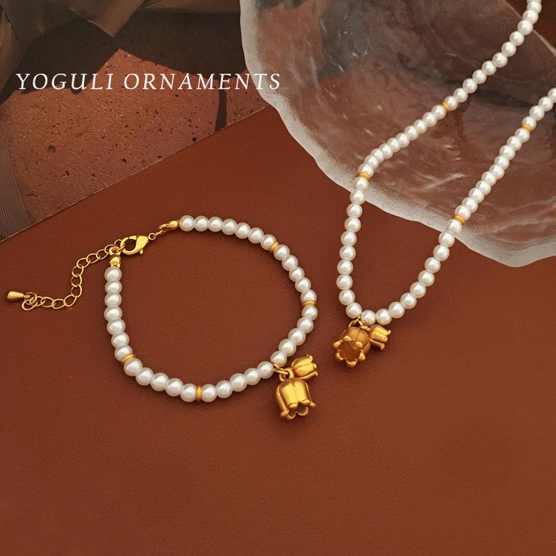 Copper-Plated Gold Lily of the Valley Pearl Bracelet - Elegant French Style Clavicle Chain for Women