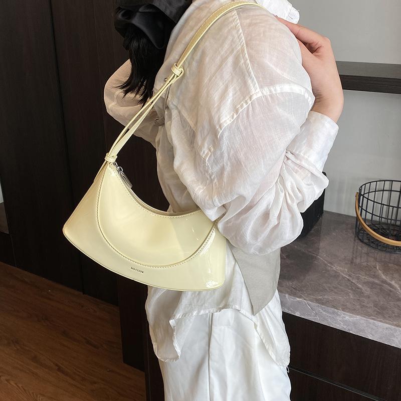 

Premium sense of foreign style small bag women s summer 2025 new fashion niche design messenger bag women s shoulder armpit bag жёлтый