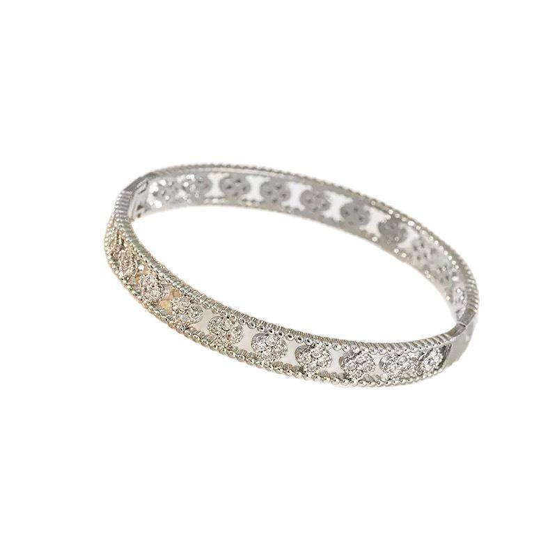 2026 Vierblättriges Kleeblatt Armband Damen Hohl Design High-End Blumenarmband Voll mit Diamanten Kaleidoskop Armband Vielseitiger Schmuck
