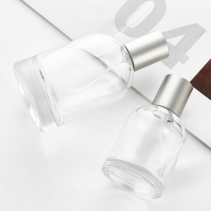 High-End 50ml Transparent Glass Perfume Bottle with Press Spray