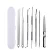Maniküre- & Pediküre-Set aus Edelstahl: Beinhaltet Hornhautentferner, Nagelknipser und Akne-Nadel.