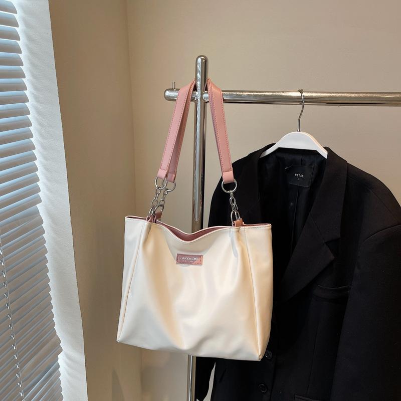 

Large-capacity tote bag women s new spring and summer contrasting color shoulder underarm bag versatile class commuter bag