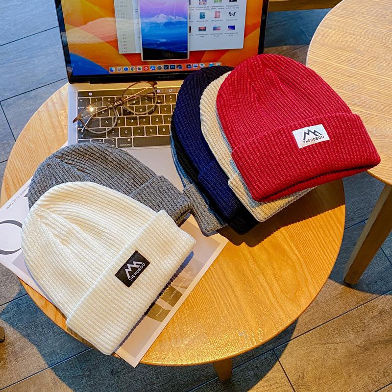 Japanese Trendy Woolen Hats: Unisex Knitted Beanies with Ear Protection for Autumn and Winter