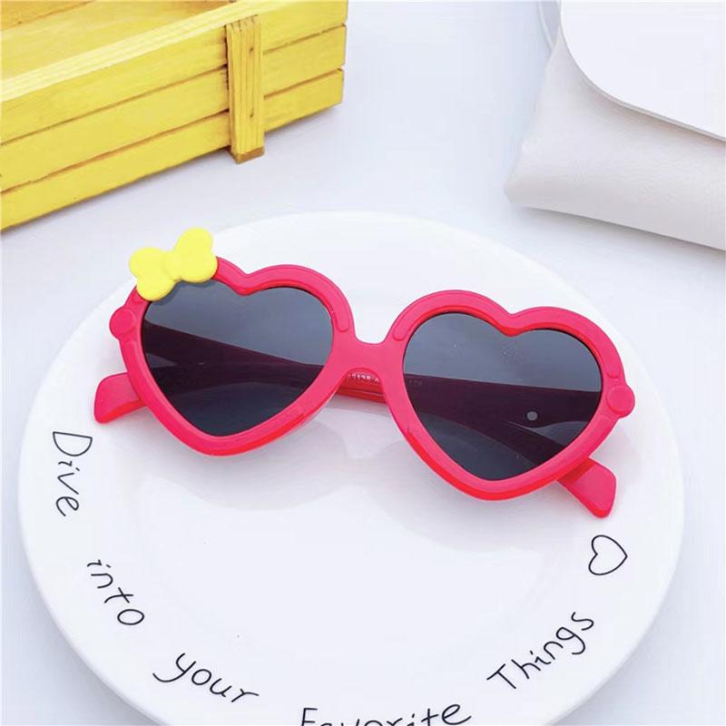 Neue Kinder-Sonnenbrille in Herzform Mädchen-Dekorative Schleife Sonnenbrille Niedliche Baby-Outdoor-Sonnenblende Brillen UV400