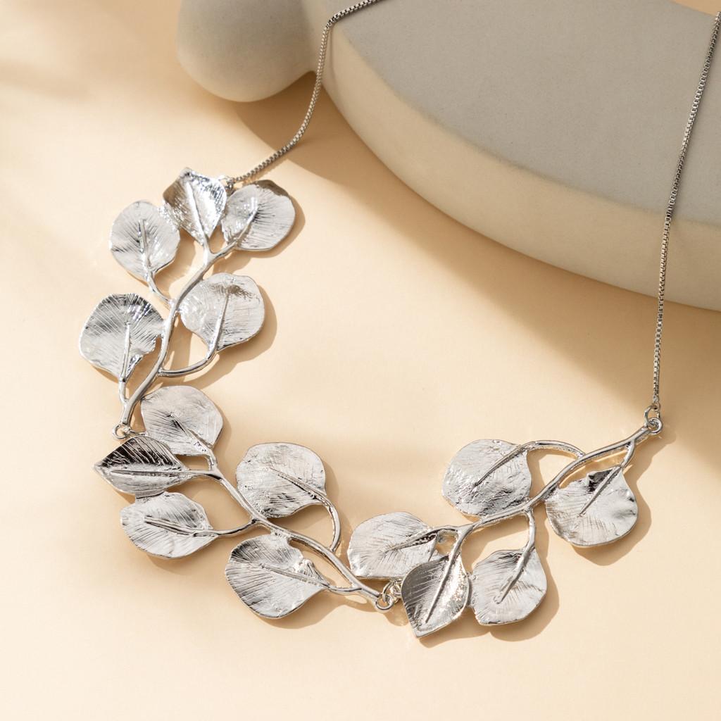 Elegant Leaf Design Alloy Earrings For Fashion Forward Women In Gold And Silver Colors