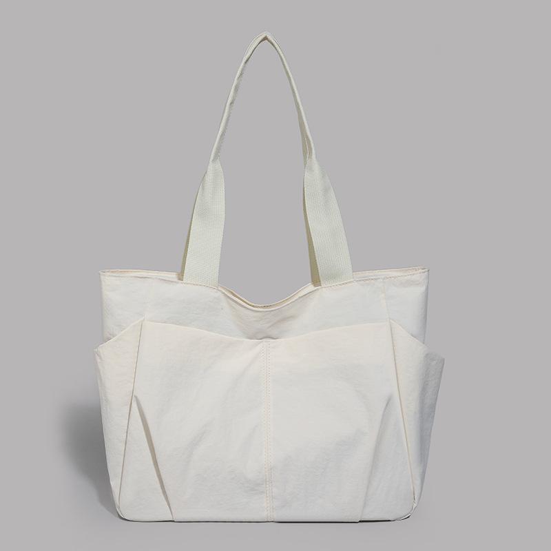 

Large capacity bag fashion trend retro simple personality summer new shoulder bag 2025 casual women tote білий