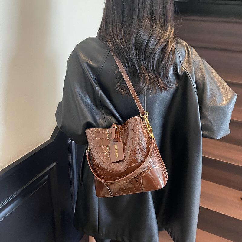 

Новая городская простая повседневная темпераментная сумка через плечо, сумка через плечо, женская сумка, сумка подмышку, сумка-ведро с каменным узором темно-коричневого