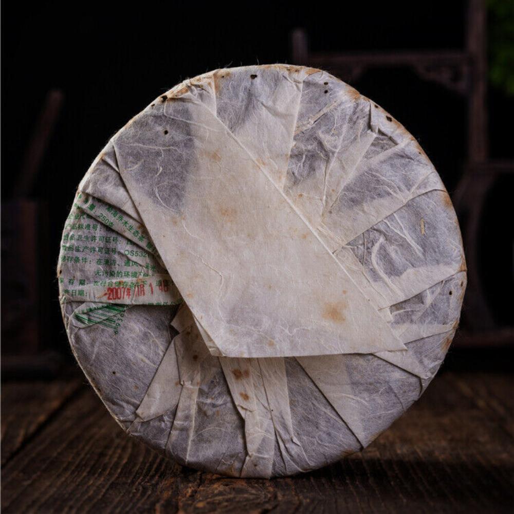 2007 Nanqiao Menghai Puer Raw Tea Arbor Pu er Торт с серебряной иглой — фото 6