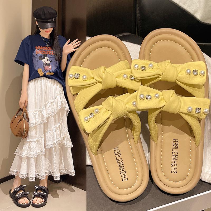Summer slippers women wear new thick-bottomed fairy bow pearl 2025 fashion open-toed cool slippers