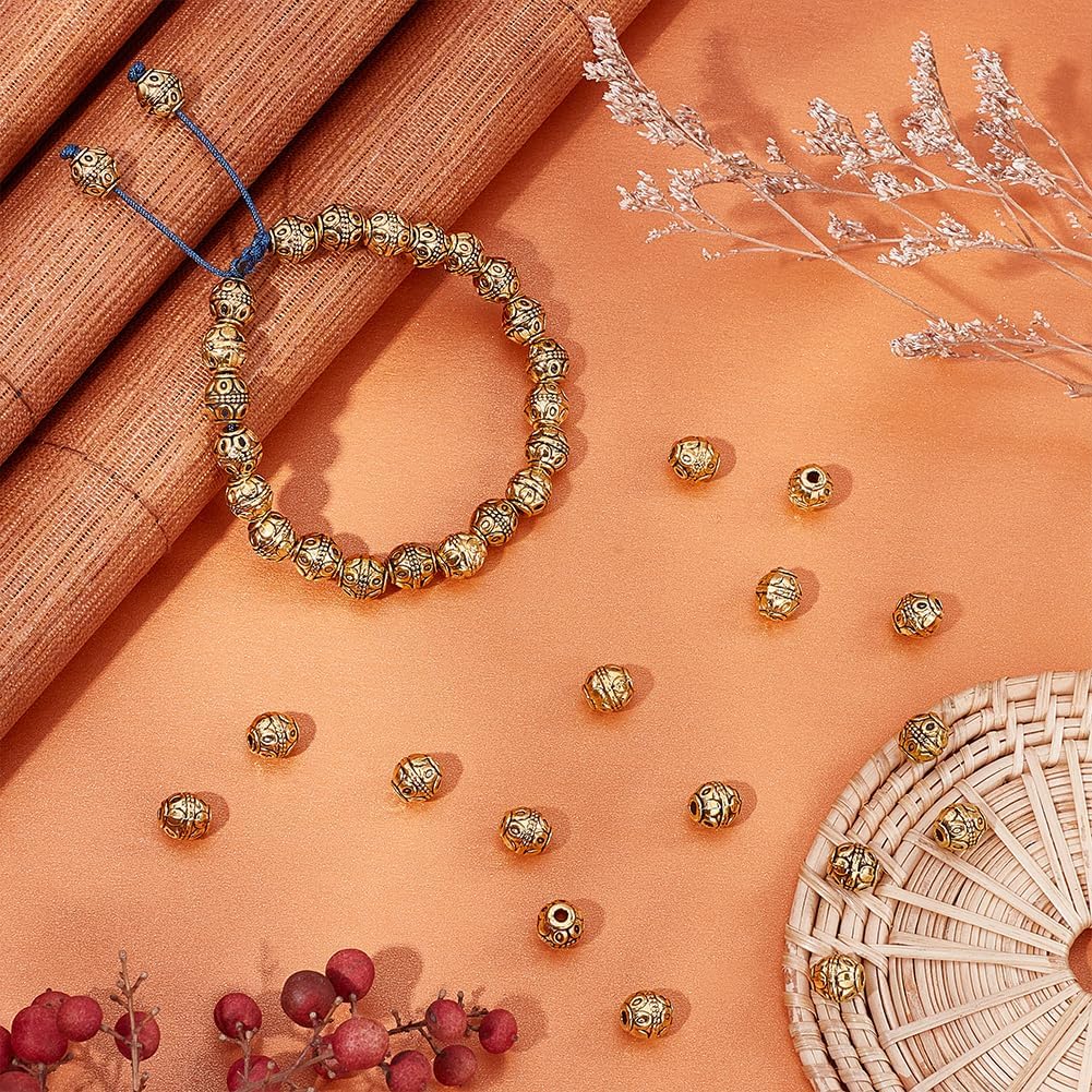 UNICRAFTALE About 100Pcs Tibetan Barrel Beads 7mm Antique Gold Beads Rondelle Spacer Beads with Large Hole Beading Bracelet Making Beads for Bracelet