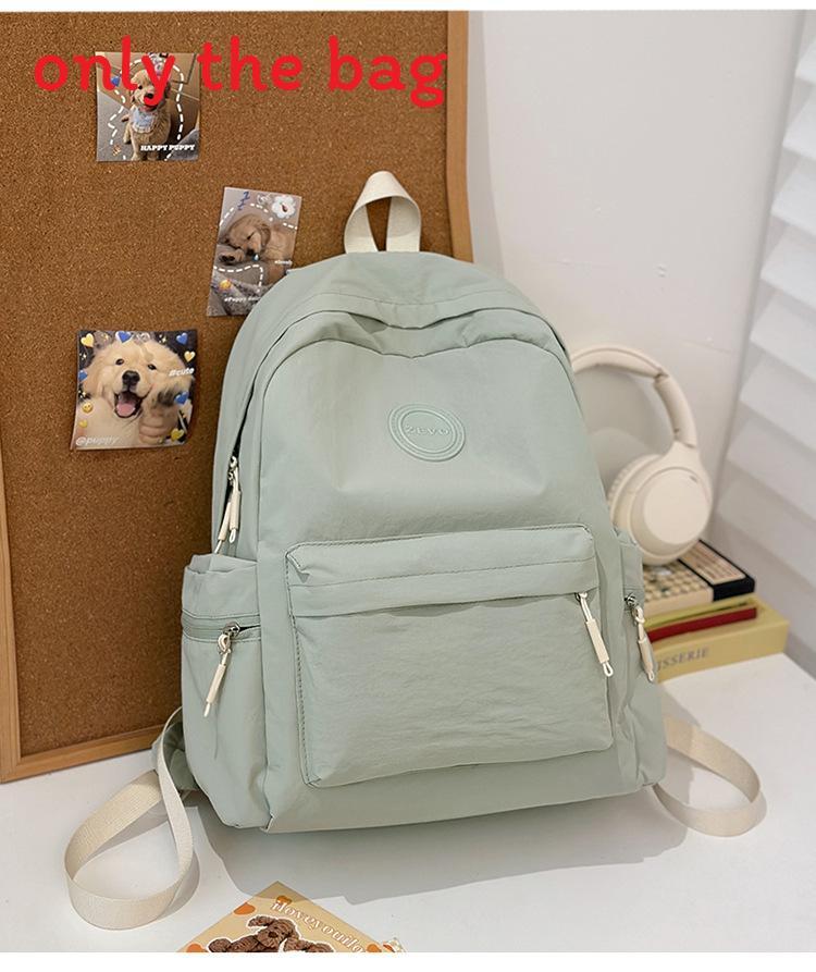 Fashionable Outdoor Ladies Backpack With Alphabet Decoration And Solid Color Design For Commuting