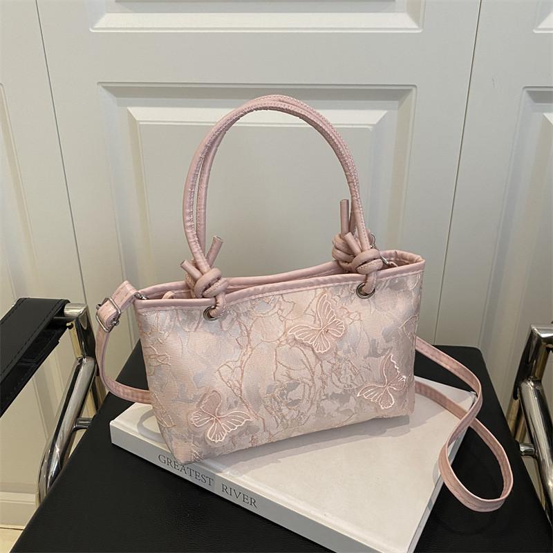 Minimalistische Spitzen-Schmetterlings-Handtasche mit Stickereien für Sommer-Casual-Outfits