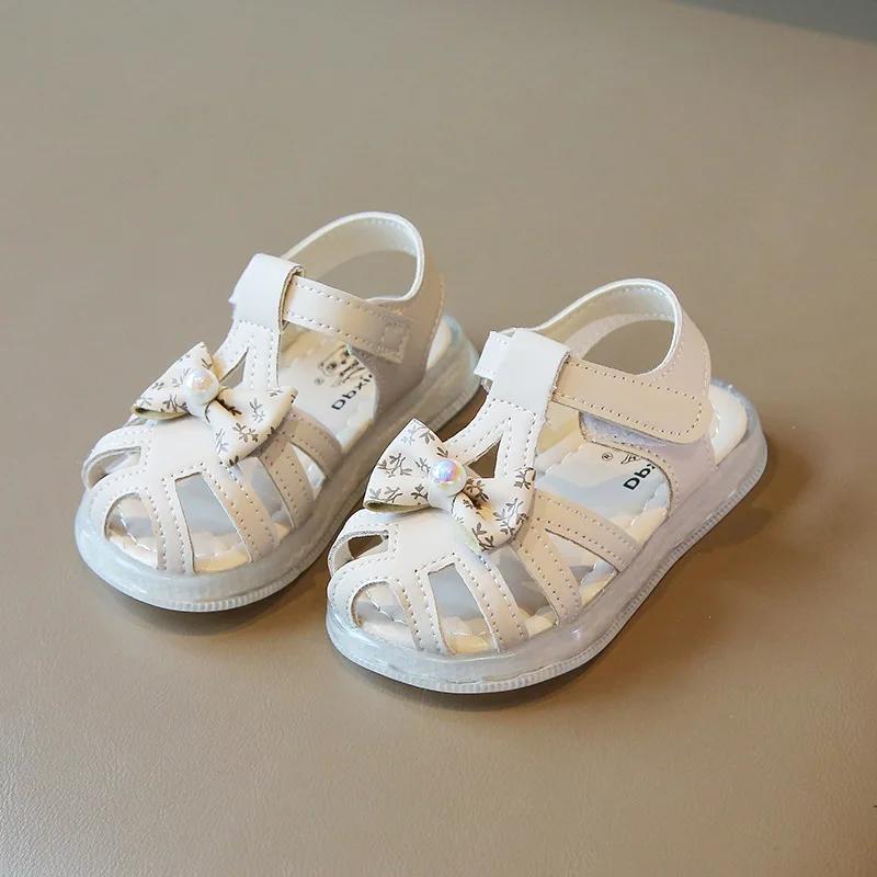 

Новые сандалии для девочек, летние, милые детские сандалии с бантиками, принцесса, первые ходоки, модные повседневные детские пляжные сандалии с вырезами 17 розовый