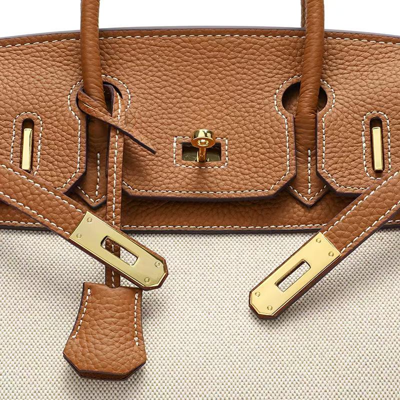 Borsa a tracolla da donna in tela platino e pelle patchwork