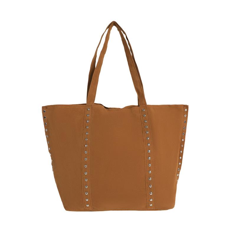 Frosted rivet bag Large capacity women s tote bag Versatile bucket bag Commuter shoulder bag Fashion casual handbag
