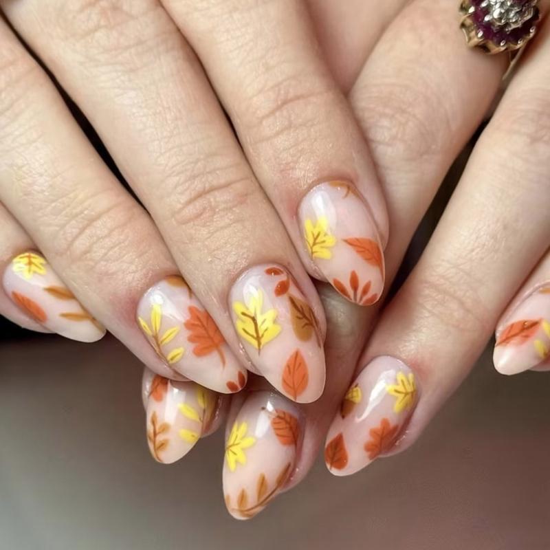 

Fall Press on Nails 24Pcs Halloween Almond Stick On Nails with Orange Maple Leaf for Women Thanksgiving Nail Art 1