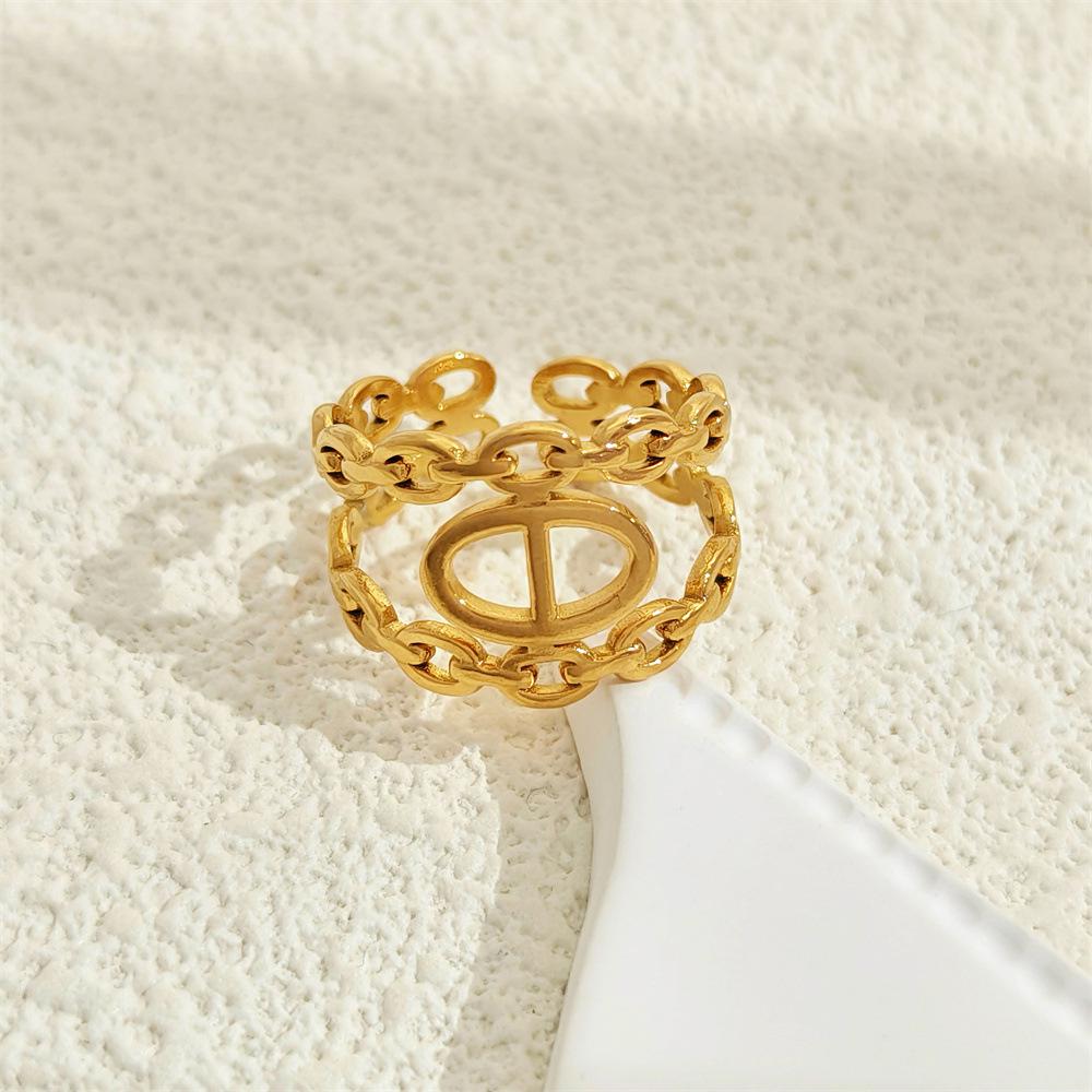 Stainless Steel Hollow Ring - European & American Cold Style Niche Design Light Luxury Women's Fashion