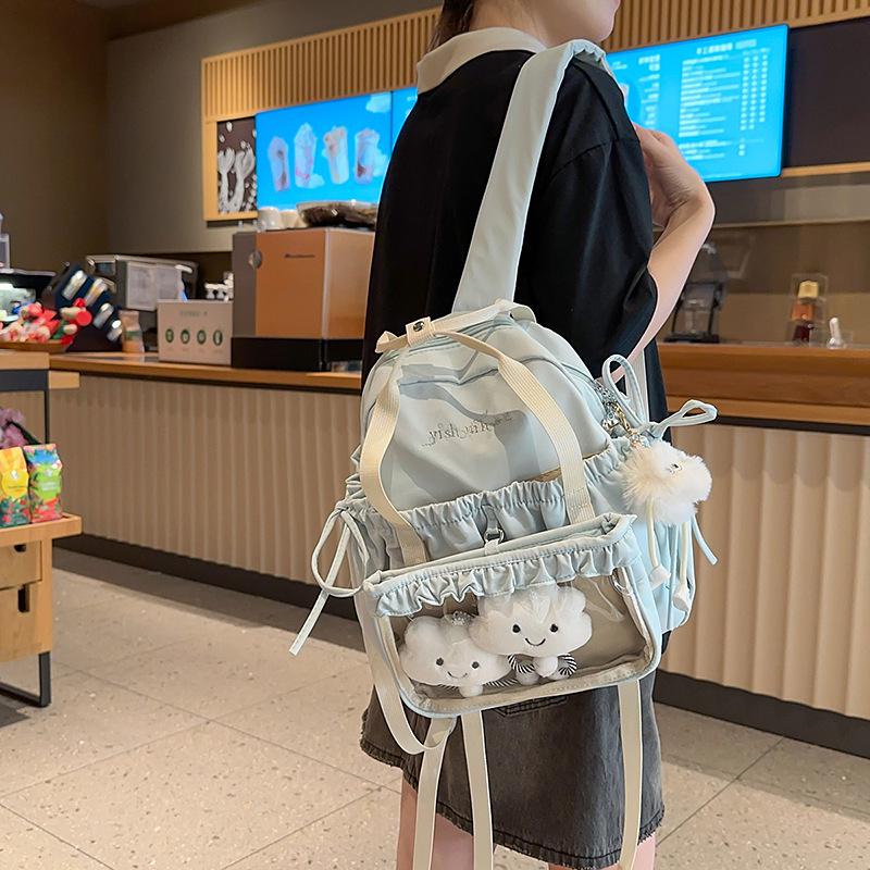 Student Rucksack mit großem Fassungsvermögen, lässig, mit Cartoon-Anstecknadeln, für Reisen und Schule