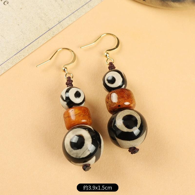 

Оригинальные нишевые тибетские бусины из пчелиного воска, плетеные серьги из коровьей кости, ретро, персонализированные, мужские и женские