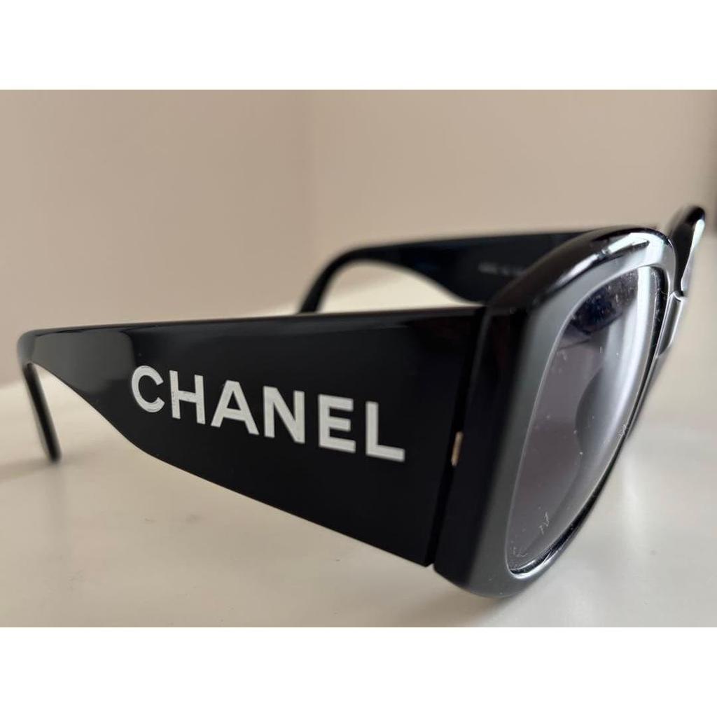 Used CHANEL sunglasses black with logo