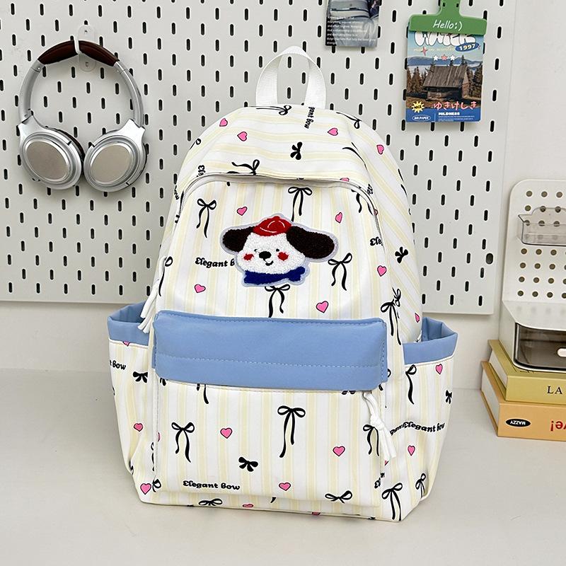 

New high-value, fresh, sweet and cute bow puppy backpack, junior high school student backpack