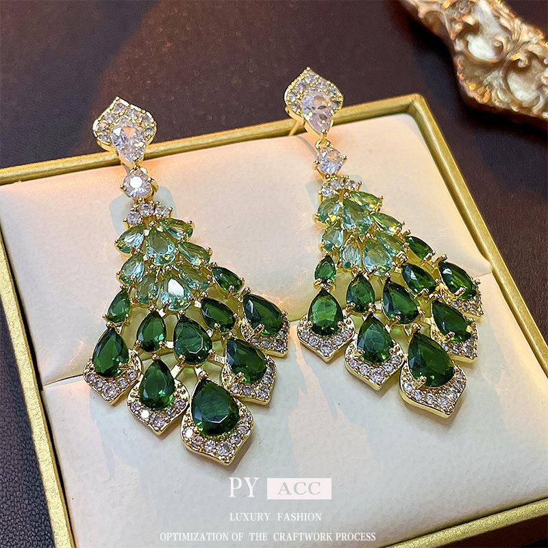 Silver Needle Cubic Zirconia Feather Dangle Earrings - Retro High-End Style, Niche Exaggerated Design for Women.