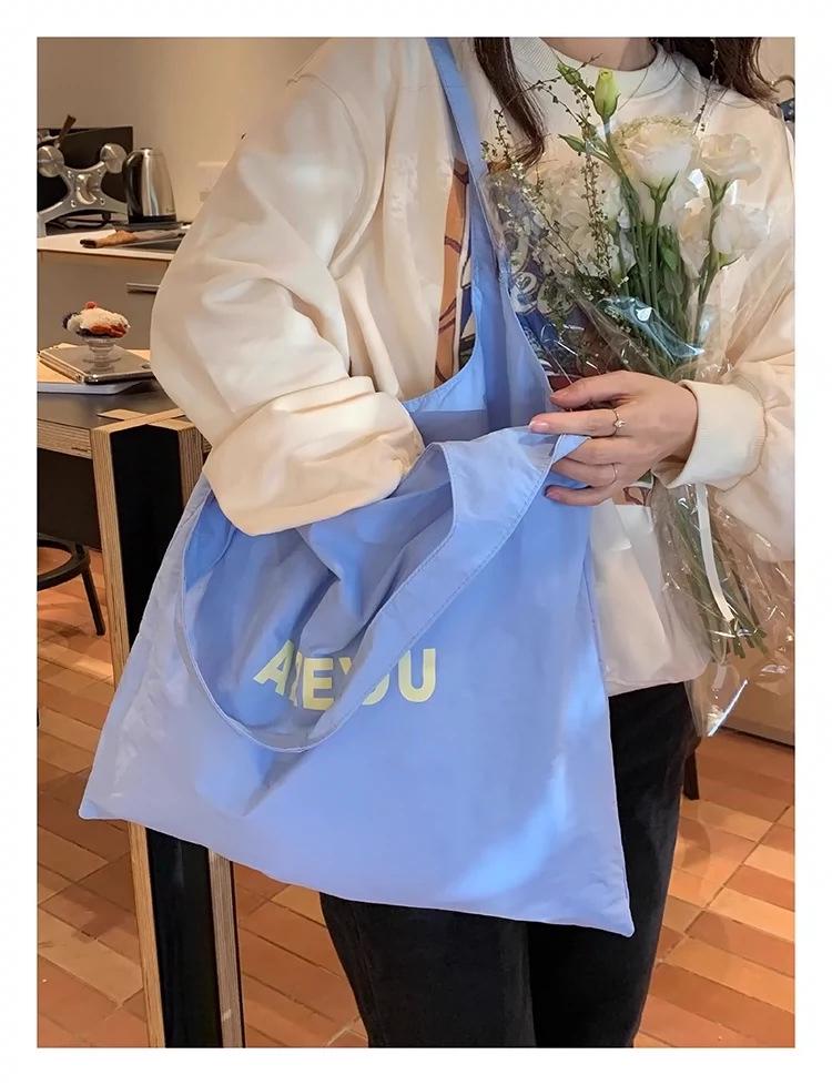 

Женская сумка-шоппер с принтом букв большой вместимости на плечо - Модная, универсальная и свежая тканевая сумка для покупок синий