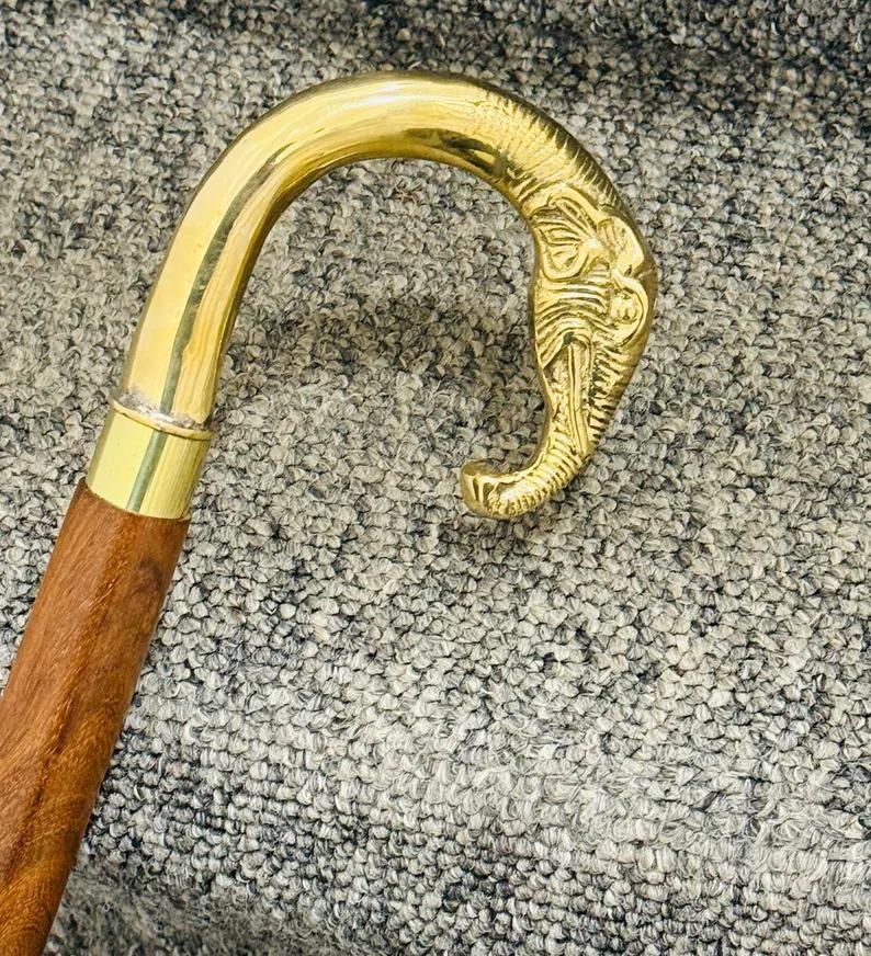 Walking Stick Black Twisted Pole With A Brass Elephant Head Comfortable Handle.