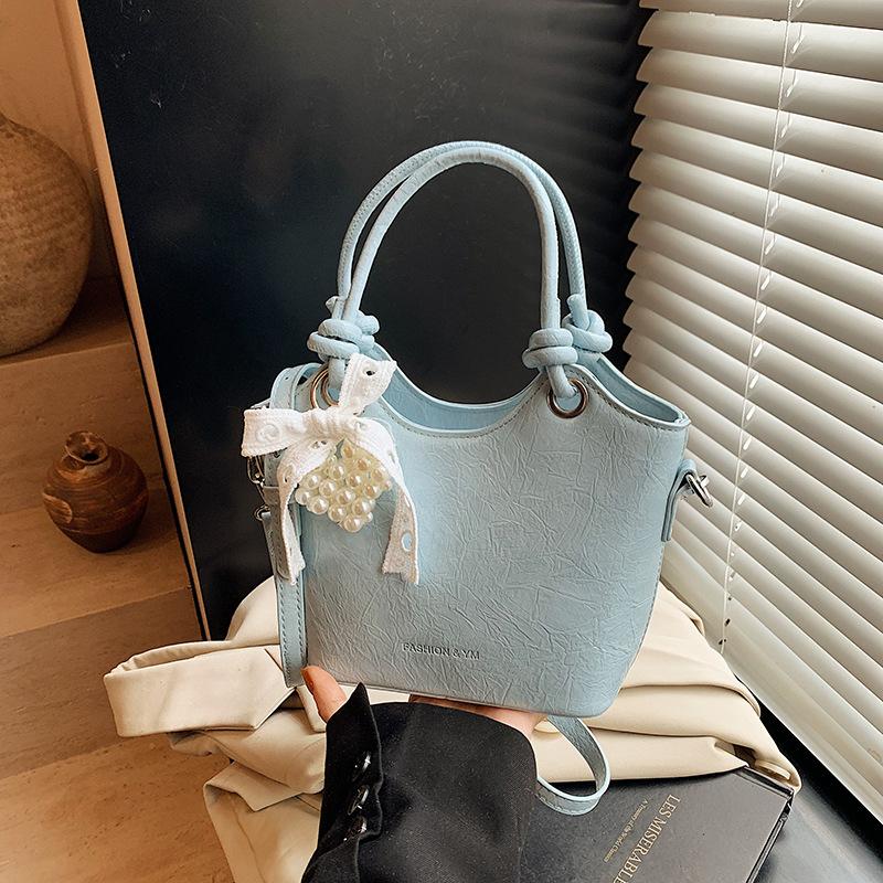 

Today s popular small bags for women s spring and summer new versatile shoulder messenger bags casual bucket bags синій