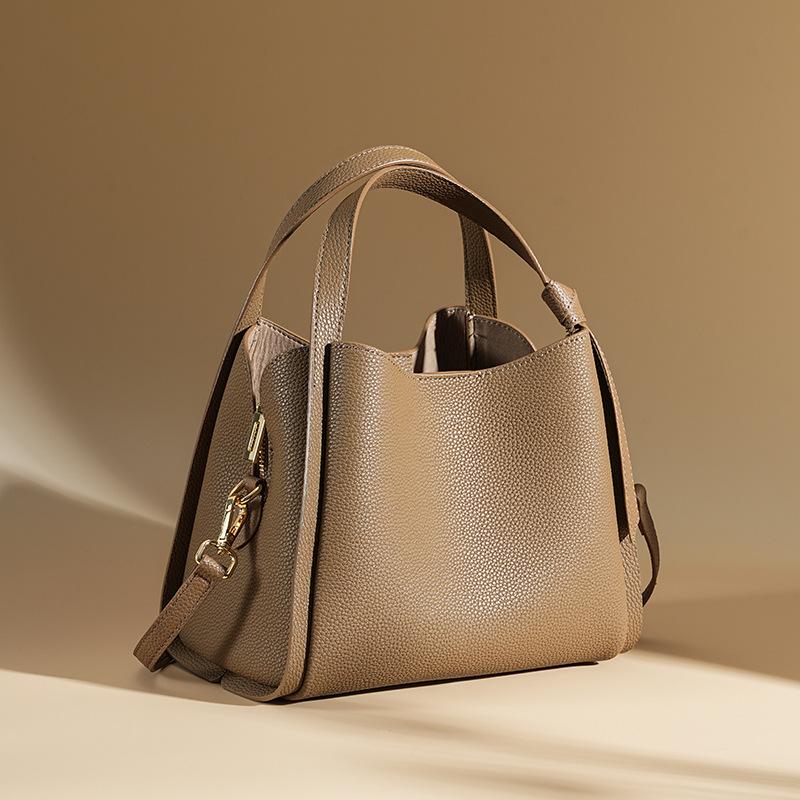 

Leather women s versatile fashion large-capacity handbag, new cowhide high-end vegetable basket, crossbody bucket bag