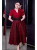 French Spring/Summer 2026 Women's V-Neck Black Bow Tie Jacquard Dress with Waist-Cinching and Wide Hem.