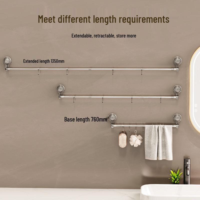 Retractable Rotating Drying Rack with Suction Cups, Detachable & Reusable for Balcony, Bathroom, or Toilet.